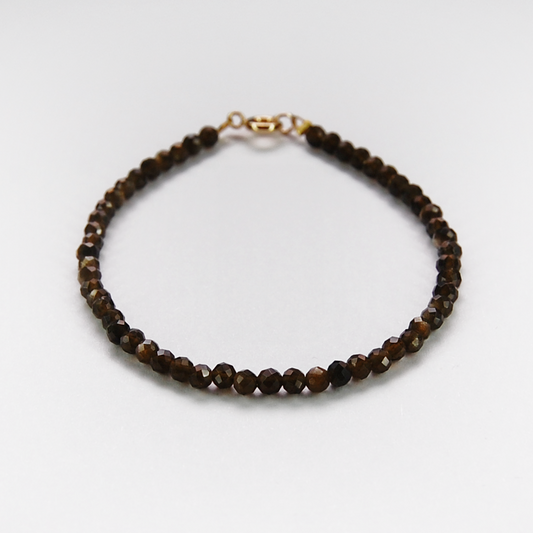 Braunes Armband mit facettierten Diamanten